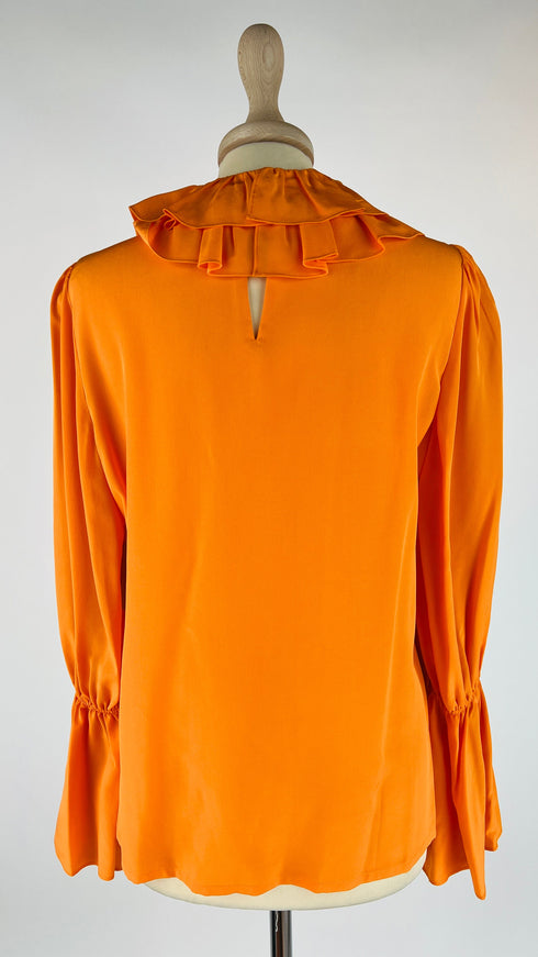 Blusa in seta con cartellino