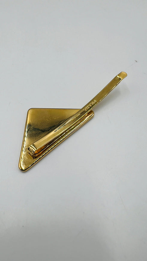 Fermacapelli triangolo singolo