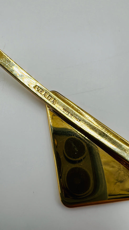 Fermacapelli triangolo singolo