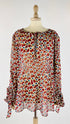 Blusa stampa a cuori astratti