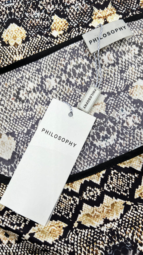 Top kaftano con cartellino