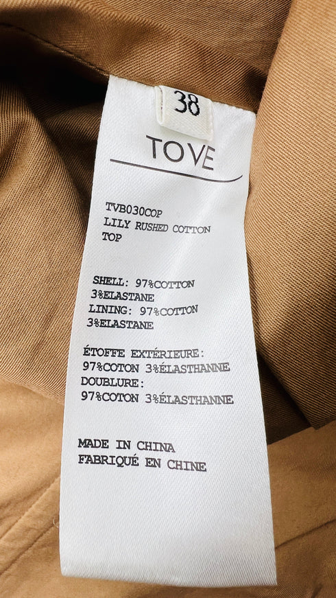 Top drappeggiato a pois