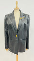 Blazer in pelle con spilla