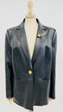 Blazer in pelle con spilla