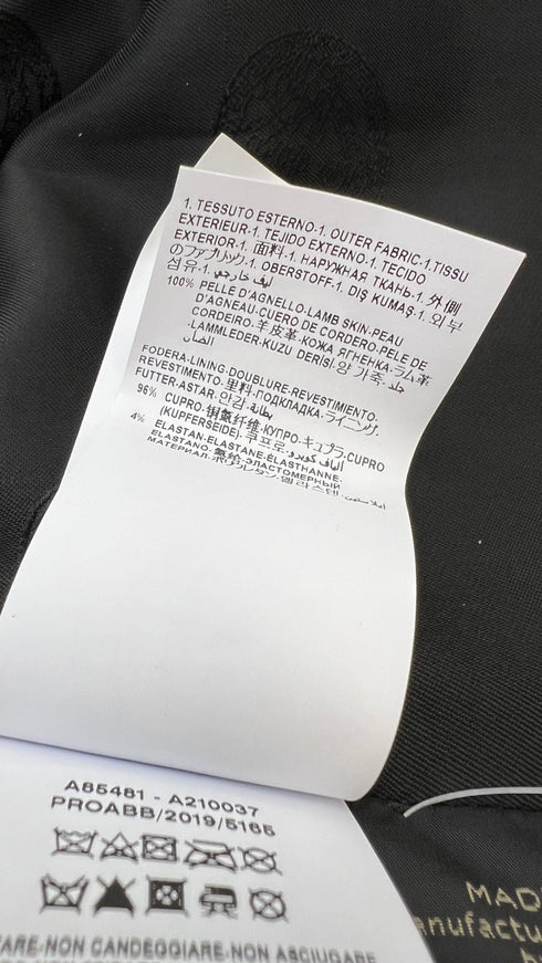 Blazer in pelle con spilla