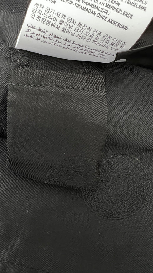 Blazer in pelle con spilla