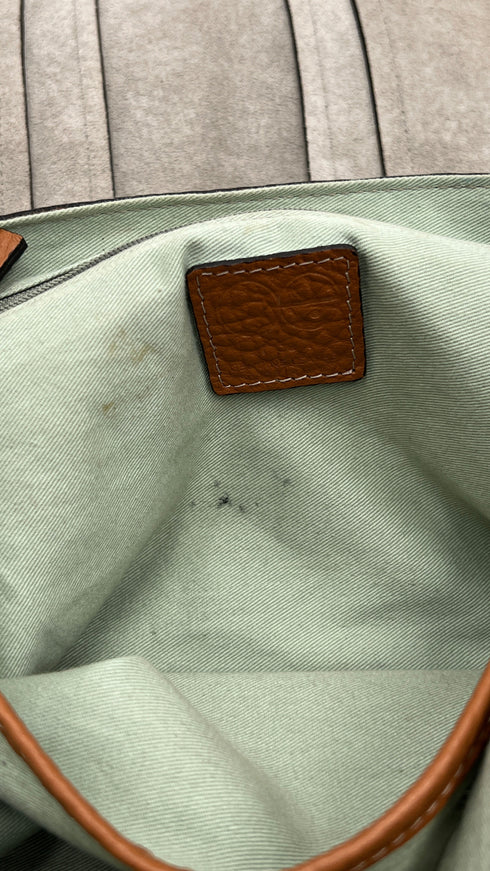 Borsa in pelle martellata