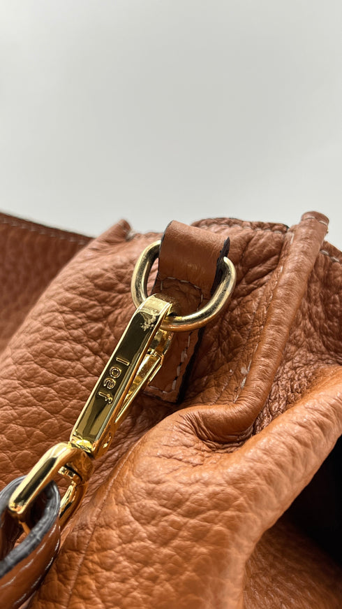 Borsa in pelle martellata
