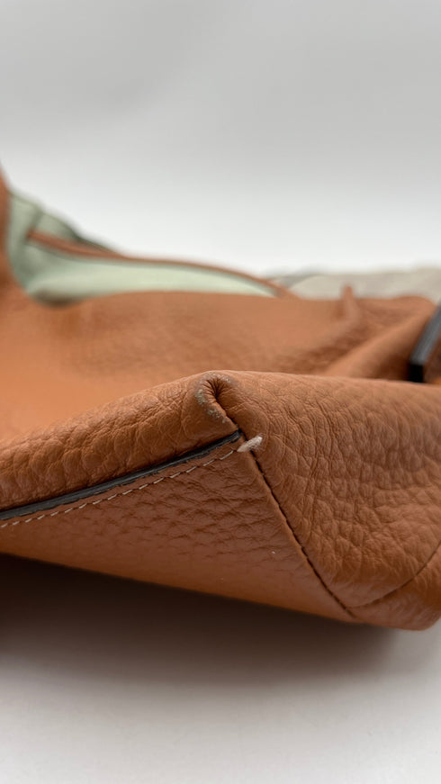 Borsa in pelle martellata
