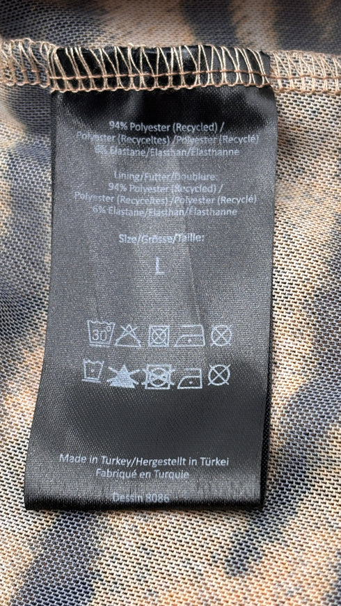 Leggings sheer animalier con cartellino