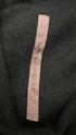 Cardigan asimmetrico nero con cartellino