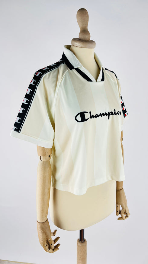 Polo a righe con cartellino