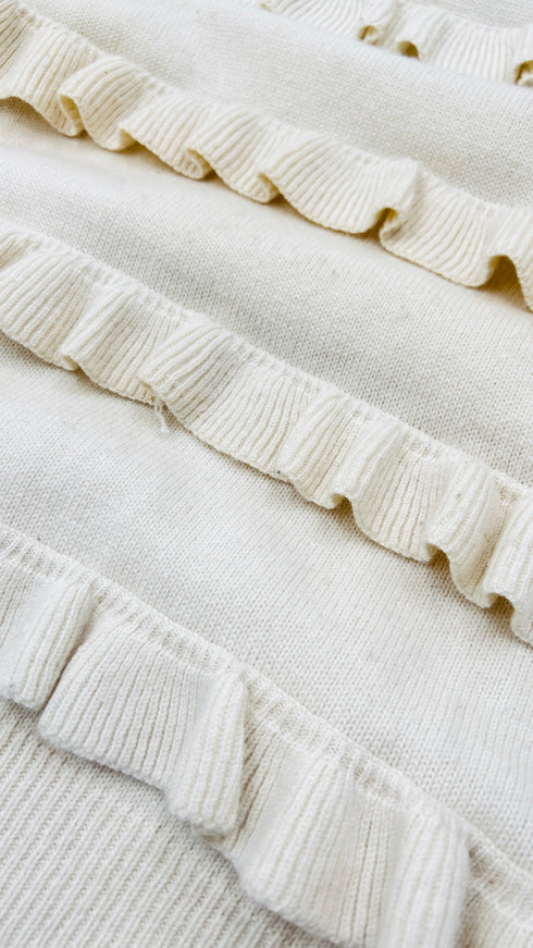 Maglia in lana con balze