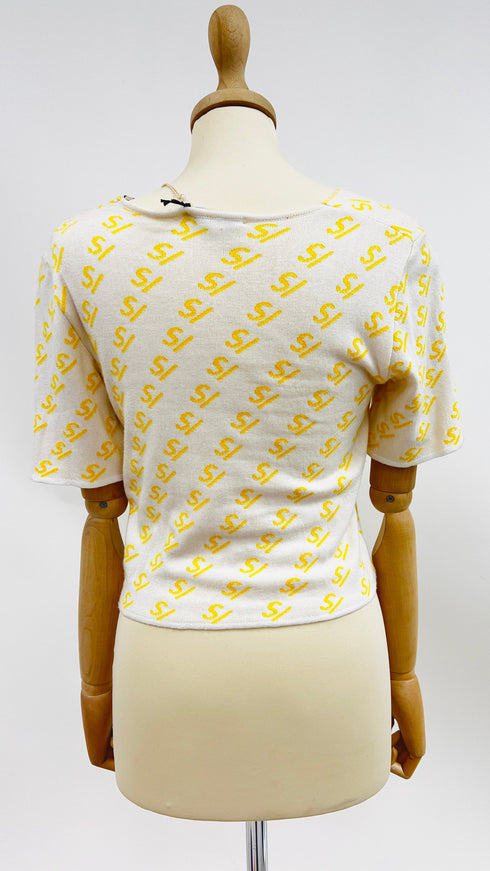 Cardigan corto con cartellino