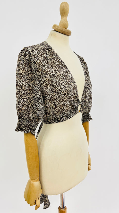 Top animalier con cartellino