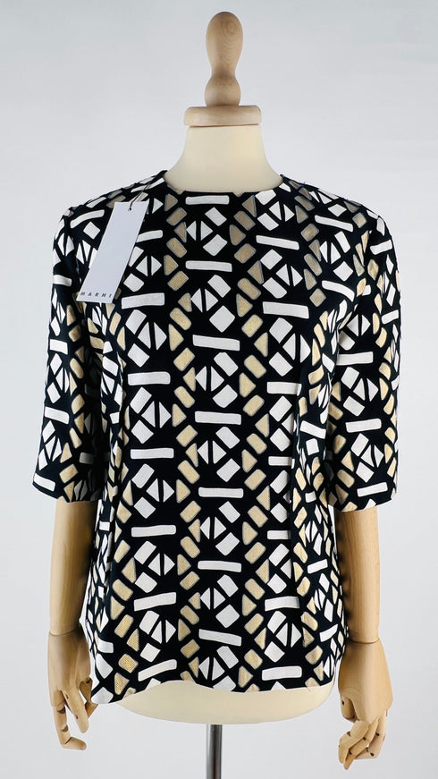 Maglia fantasia con cartellino