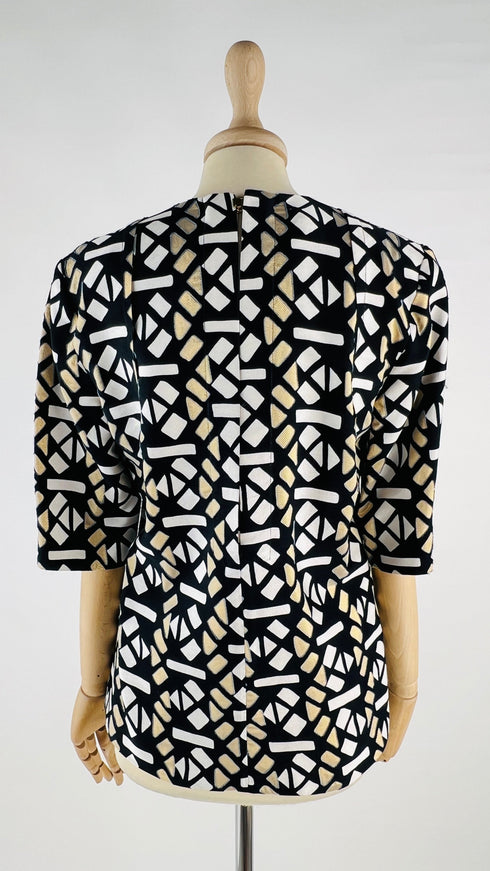 Maglia fantasia con cartellino