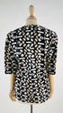 Maglia fantasia con cartellino