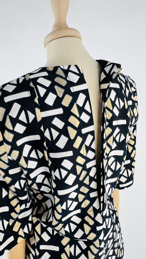 Maglia fantasia con cartellino