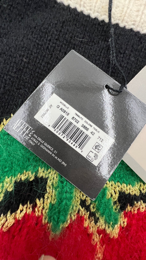 Polo maglia cartellino