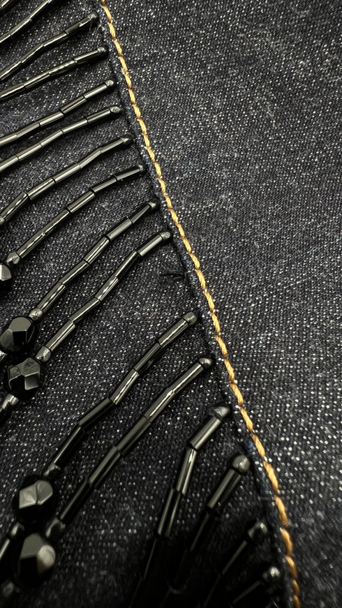 Smanicato in denim con frange