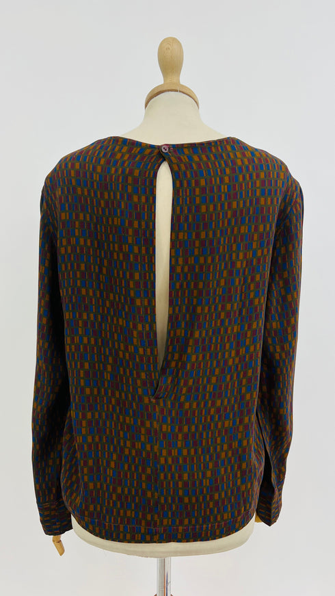 Blusa motivo geometrico