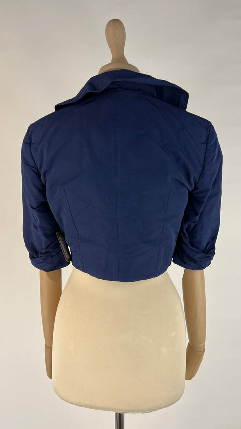 Bolero blu con cartellino