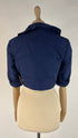 Bolero blu con cartellino
