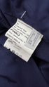 Bolero blu con cartellino