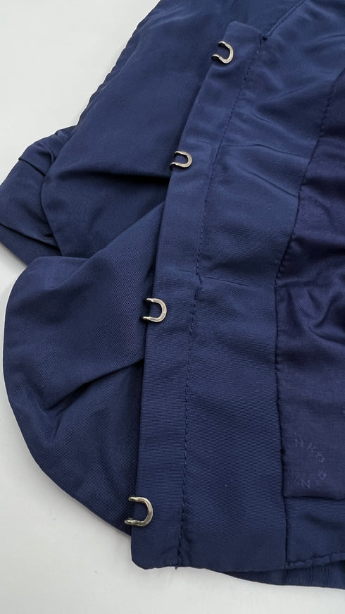 Bolero blu con cartellino