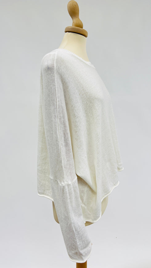 Maglia bianca asimmetrica