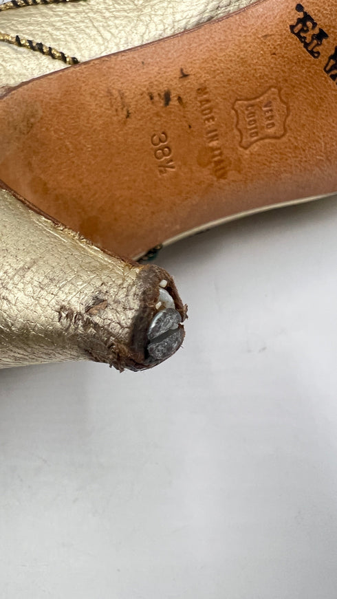 Décolleté dorate con appliqués