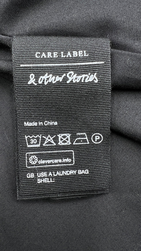 Abito corto in pizzo nero