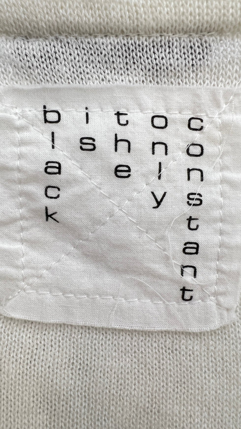 Maglia bianca asimmetrica