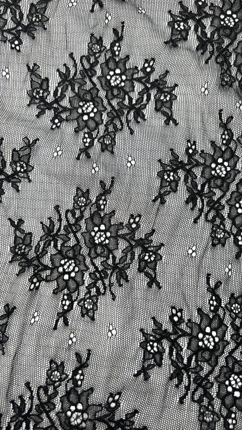 Abito lungo in pizzo