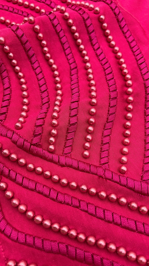 Blusa orlo con ricami perle