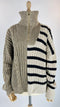 Maglione trecce e righe
