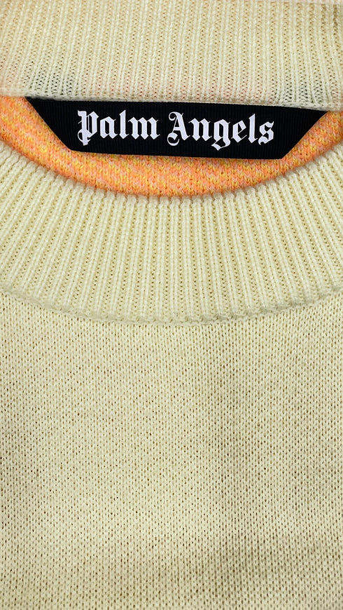 Maglione oversized con cartellino