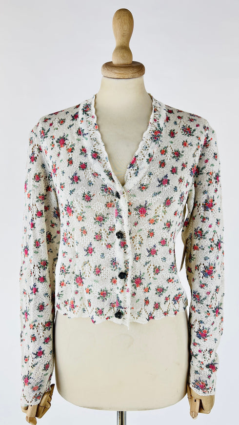 Cardigan floreale con bottoni gioiello