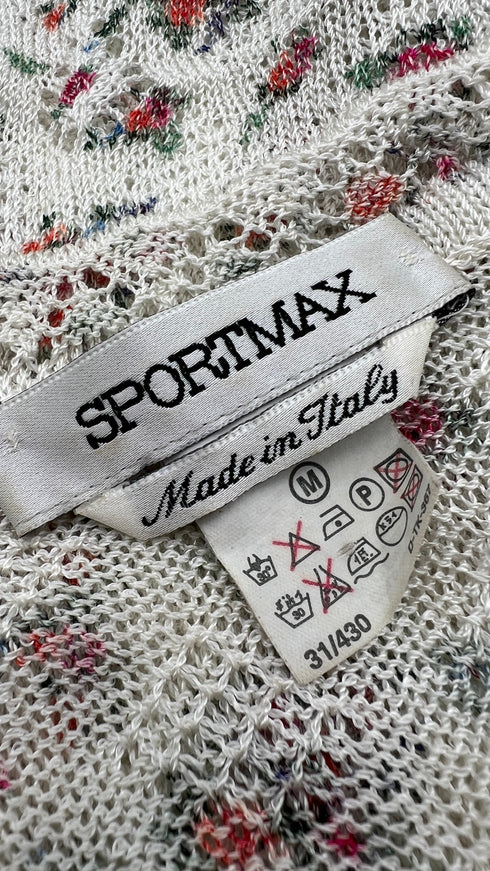 Cardigan floreale con bottoni gioiello