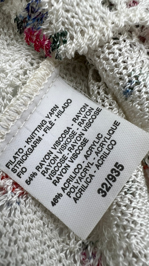 Cardigan floreale con bottoni gioiello