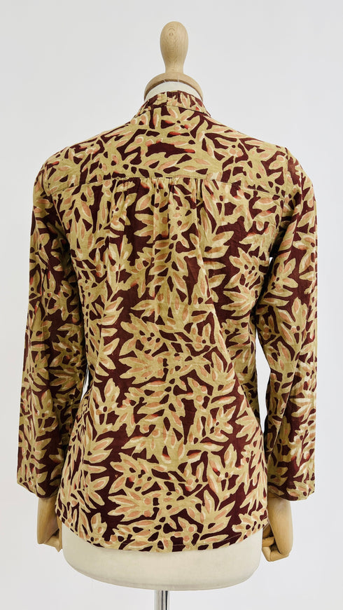 Blusa floreale astratta