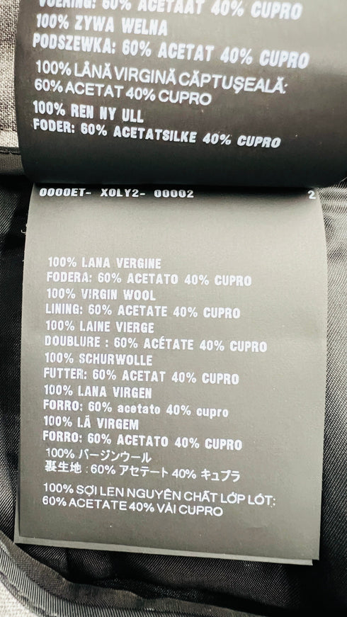 Gonna pieghe con cartellino