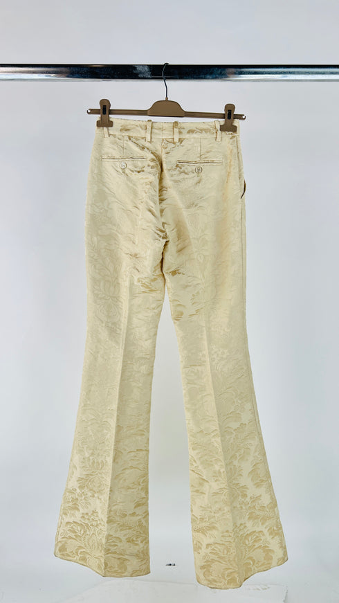 Pantaloni flared damascati con cartellino