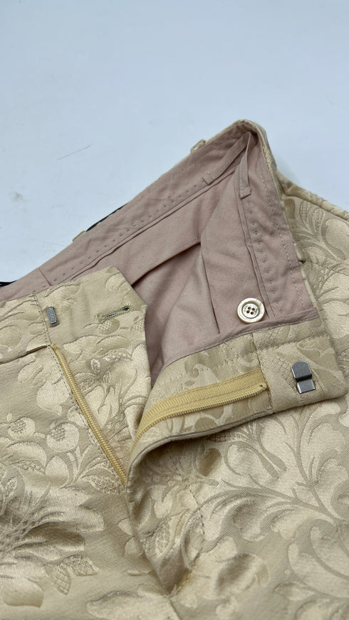 Pantaloni flared damascati con cartellino