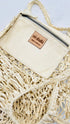 Borsa intrecciata in pelle