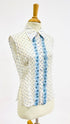 Camicia pois e ricamo
