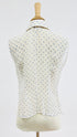 Camicia pois e ricamo