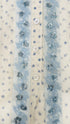 Camicia pois e ricamo