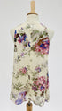 Top in seta a fiori con cartellino